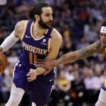 Phoenix Suns guard Ricky Rubio (11) drives as Golden State Warriors guard Damion Lee (1) defends during the second half of an NBA basketball game Saturday, Feb. 29, 2020, in Phoenix. The Warriors won 115-99. (AP Photo/Matt York)