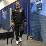 Ohio State defensive lineman Chase Young walks on the stage for a press conference at the NFL football scouting combine in Indianapolis, Thursday, Feb. 27, 2020. (AP Photo/AJ Mast)