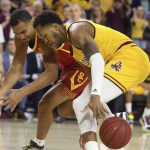 Arizona State forward Kimani Lawrence, front, steals the ball from Southern California guard Kyle Sturdivant, left, during the first half of an NCAA college basketball game Saturday, Feb. 8, 2020, in Tempe, Ariz. (AP Photo/Ross D. Franklin)