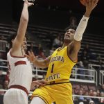 Arizona State guard Remy Martin (1) shoots against Stanford forward Spencer Jones during the first half of an NCAA college basketball game in Stanford, Calif., Thursday, Feb. 13, 2020. (AP Photo/Jeff Chiu)