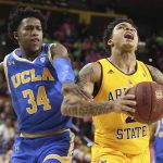 UCLA's David Singleton (34) fouls Arizona State's Rob Edwards during the second half of an NCAA college basketball game Thursday, Feb. 6, 2020, in Tempe, Ariz. (AP Photo/Darryl Webb)