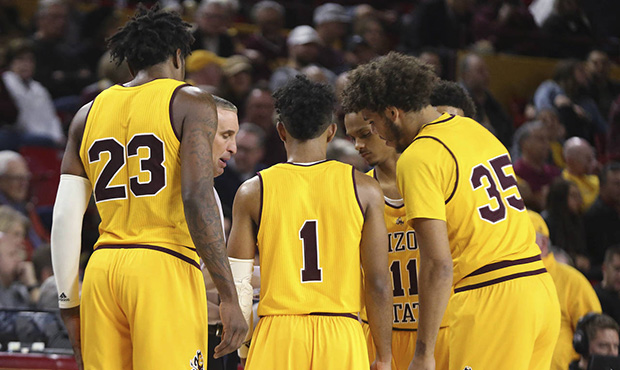 Arizona State head coach Bobby Hurley draws up a play for his team during the second half of an NCA...