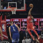 Donovan Mitchell of the Utah Jazz dunks during the first half of the NBA All-Star basketball game Sunday, Feb. 16, 2020, in Chicago. (AP Photo/Nam Huh)