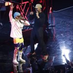 Lil Wayne and Chance the Rapper perform during halftime of the NBA All-Star basketball game Sunday, Feb. 16, 2020, in Chicago. (AP Photo/David Banks)