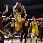 
              Southern California guard Elijah Weaver (3) shoots over Arizona State guard Jaelen House (10) during the first half of an NCAA college basketball game Saturday, Feb. 29, 2020, in Los Angeles. (AP Photo/Marcio Jose Sanchez)
            