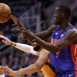 Detroit Pistons forward Thon Maker passes the ball during the first half of an NBA game against the Phoenix Suns, Friday, Feb. 28, 2020, in Phoenix. (AP Photo/Matt York)