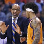 Phoenix Suns coach Monty Williams, left, talks with forward Kelly Oubre Jr. during the second half of the team's NBA basketball game against the Houston Rockets on Friday, Feb. 7, 2020, in Phoenix. The Suns won 127-91. (AP Photo/Ross D. Franklin)