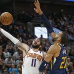 Phoenix Suns guard Ricky Rubio (11) goes to the basket as Utah Jazz center Rudy Gobert (27) defends in the second half during an NBA basketball game Monday, Feb. 24, 2020, in Salt Lake City. (AP Photo/Rick Bowmer)