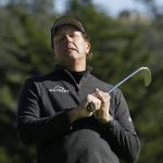 Phil Mickelson reacts after missing a birdie putt on the third green of the Pebble Beach Golf Links during the final round of the AT&T Pebble Beach National Pro-Am golf tournament Sunday, Feb. 9, 2020, in Pebble Beach, Calif. (AP Photo/Eric Risberg)