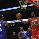 Joel Embiid of the Philadelphia 76ers shoots during the second half of the NBA All-Star basketball game Sunday, Feb. 16, 2020, in Chicago. (AP Photo/Nam Huh)
