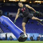 Charlotte defensive lineman Alex Highsmith runs a drill at the NFL football scouting combine in Indianapolis, Saturday, Feb. 29, 2020. (AP Photo/Michael Conroy)