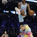 Miami Heat's Derrick Jones Jr. heads to the basket during the NBA All-Star slam dunk contest in Chicago, Saturday, Feb. 15, 2020. (AP Photo/Nam Y. Huh)