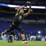 South Florida tight end Mitchell Wilcox runs a drill at the NFL football scouting combine in Indianapolis, Thursday, Feb. 27, 2020. (AP Photo/Michael Conroy)