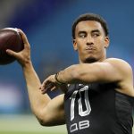 FILE - In this Thursday, Feb. 27, 2020, file photo, Utah State quarterback Jordan Love works out at the NFL football scouting combine in Indianapolis. After turning heads last month at the Senior Bowl, Love delivered with another impressive workout Thursday. (AP Photo/Charlie Neibergall, File)
