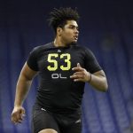 Iowa offensive lineman Tristan Wirfs runs the 40-yard dash at the NFL football scouting combine in Indianapolis, Friday, Feb. 28, 2020. (AP Photo/Charlie Neibergall)