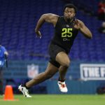 USC offensive lineman Austin Jackson runs a drill at the NFL football scouting combine in Indianapolis, Friday, Feb. 28, 2020. (AP Photo/Michael Conroy)