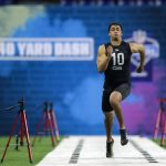 FILE - In this Thursday, Feb. 27, 2020, file photo, Utah State quarterback Jordan Love runs the 40-yard dash at the NFL football scouting combine in Indianapolis. After turning heads last month at the Senior Bowl, Love delivered with another impressive workout Thursday. (AP Photo/Michael Conroy, File)
