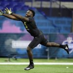 Arizona State running back Eno Benjamin runs a drill at the NFL football scouting combine in Indianapolis, Friday, Feb. 28, 2020. (AP Photo/Charlie Neibergall)