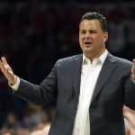 Arizona coach Sean Miller reacts to a foul call during the first half of the team's NCAA college basketball game against UCLA on Saturday, Feb. 8, 2020, in Tucson, Ariz. (AP Photo/Rick Scuteri)