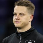 LSU quarterback Joe Burrow watches a drill at the NFL football scouting combine in Indianapolis, Thursday, Feb. 27, 2020. (AP Photo/Charlie Neibergall)
