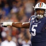 Auburn defensive tackle Derrick Brown (5) lines up against Georgia during the second half of an NCAA college football game in Auburn, Ala. Brown has been a play making, blockbusting force for No. 16 Auburn heading into the Iron Bowl. (AP Photo/Butch Dill, File)