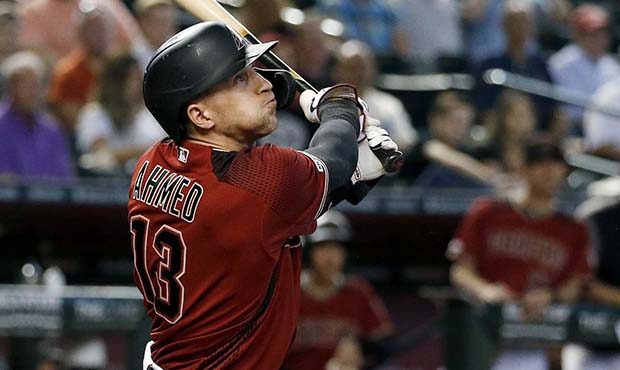 Arizona Diamondbacks' Nick Ahmed watches his ground-rule double against the St. Louis Cardinals dur...