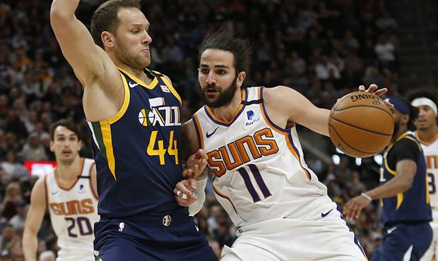 Phoenix Suns guard Ricky Rubio (11) drives against Utah Jazz forward Bojan Bogdanovic (44) in the s...