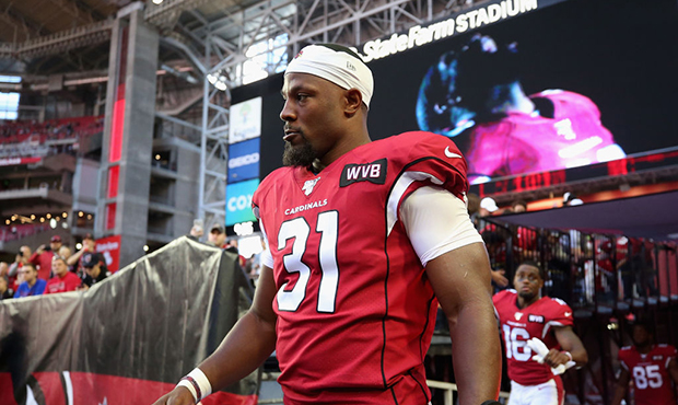 Running back David Johnson #31 of the Arizona Cardinals walks onto the field before the NFL game ag...