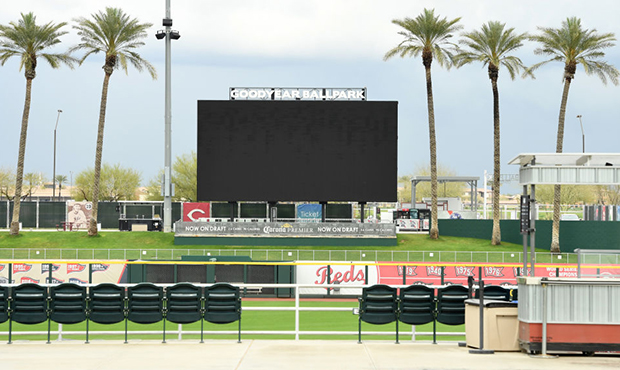 A detail of the blank scoreboard and empty seats at Goodyear Ballpark after Major League Baseball s...