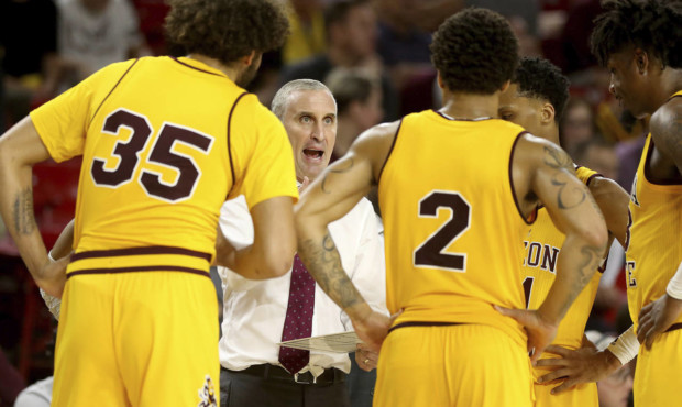 Arizona State coach Bobby Hurley talks to the team during the second half of an NCAA college basket...