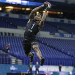 Ohio State defensive back Damon Arnette runs a drill at the NFL football scouting combine in Indianapolis, Sunday, March 1, 2020. (AP Photo/Michael Conroy)
