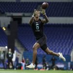 Mississippi State defensive back Cameron Dantzler runs a drill at the NFL football scouting combine in Indianapolis, Sunday, March 1, 2020. (AP Photo/Michael Conroy)