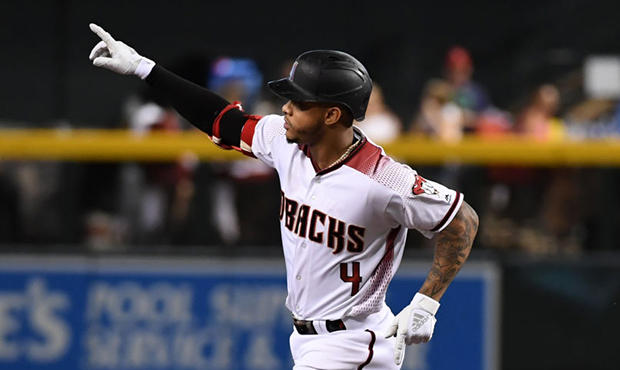 Ketel Marte #4 of the Arizona Diamondbacks rounds the bases after hitting a two run home run off of...