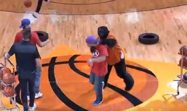 Another Suns fan hits half-court shot to win Kia Telluride