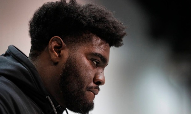 Louisville offensive lineman Mekhi Becton speaks during a press conference at the NFL football scou...