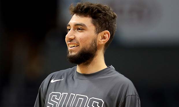 Ty Jerome #10 of the Phoenix Suns watches on before their game against the Charlotte Hornets at Spe...