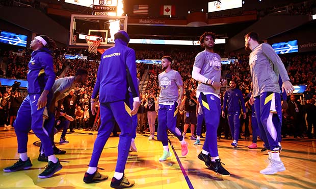 Stephen Curry #30 of the Golden State Warriors walks on to the floor for player introductions befor...