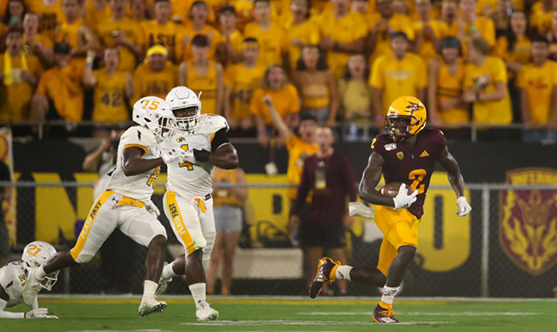 Wide receiver Brandon Aiyuk #2 of the Arizona State Sun Devils runs with the football after a 24 ya...