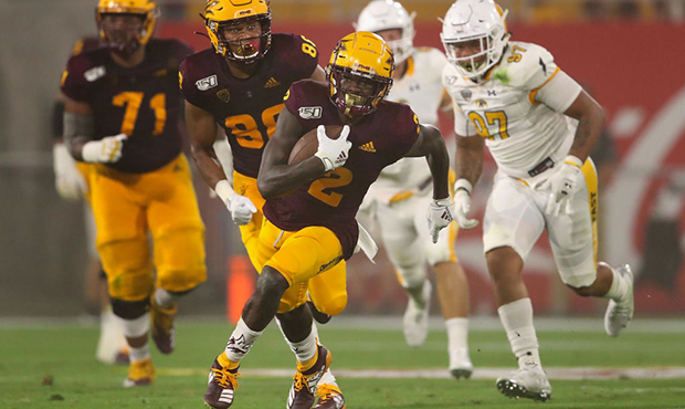 Wide receiver Brandon Aiyuk #2 of the Arizona State Sun Devils runs with the football en route to s...