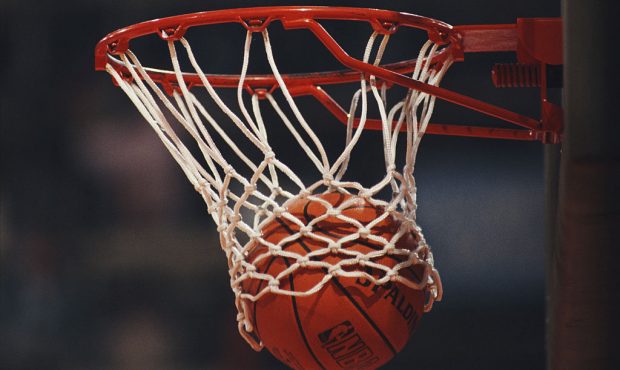 Generic view of a Spalding NBA basketball dropping into the hoop during the FIBA European Basketbal...