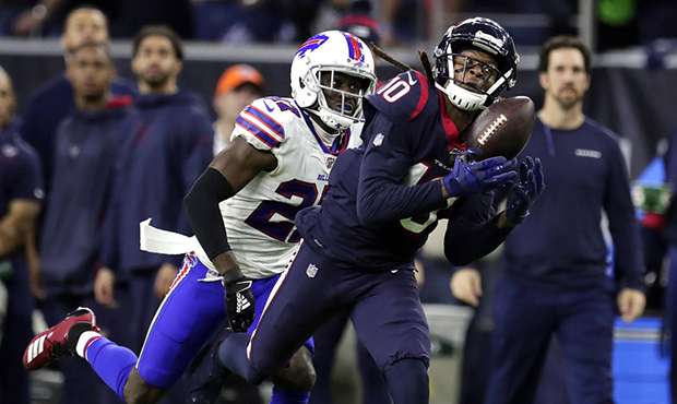 Houston Texans wide receiver DeAndre Hopkins (10) catches a pass for a first down as Buffalo Bills ...