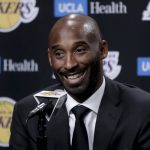 FILE - In this Dc. 18, 2017 file photo, former Los Angeles Laker Kobe Bryant talks during a news conference in Los Angeles.  Bryant and fellow NBA greats Tim Duncan and Kevin Garnett headlined a nine-person group announced Saturday, April 4, 2020,  as this year's class of enshrinees into the Naismith Memorial Basketball Hall of Fame. They all got into the Hall in their first year of eligibility, as did WNBA great Tamika Catchings. Two-time NBA champion coach Rudy Tomjanovich, longtime Baylor women's coach Kim Mulkey, 1,000-game winner Barbara Stevens of Bentley and three-time Final Four coach Eddie Sutton were selected. So was former FIBA Secretary General Patrick Baumann. (AP Photo/Chris Carlson, File)