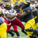 FILE - In this Oct. 6, 2018, file photo, Maryland inside linebacker Isaiah Davis (22) is blocked by Michigan offensive lineman Cesar Ruiz (51) in the second quarter of an NCAA college football game in Ann Arbor, Mich. Ruiz  is a possible pick in the NFL Draft which runs Thursday, April 23, 2020, thru Saturday, April 25. (AP Photo/Tony Ding, File)