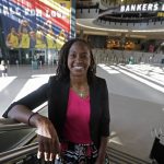 FILE - In this June 26, 2019 file photo, Tamika Catchings poses for a photo inside Banker's Life Fieldhouse in Indianapolis. Catchings is part of a nine-person group announced Saturday, April 4, 2020,  as this year's class of enshrinees into the Naismith Memorial Basketball Hall of Fame.   (AP Photo/Darron Cummings, File)