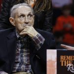 FILE - In this Jan. 20, 2018 file photo, former Oklahoma State basketball coach Eddie Sutton is pictured on the court in Stillwater, Okla.  Sutton is part of a nine-person group announced Saturday, April 4, 2020,  as this year's class of enshrinees into the Naismith Memorial Basketball Hall of Fame.  (AP Photo/Sue Ogrocki, File)