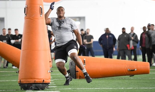 Defensive tackle Derrick Brown works out during Auburn NCAA college football Pro Day Friday, March ...