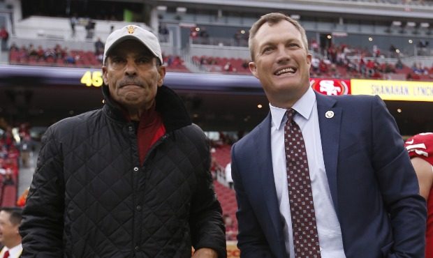 Head Coach Herm Edwards of Arizona State stands on the sideline with General Manager John Lynch of ...