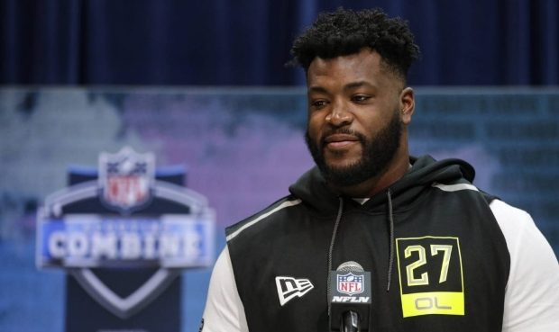 Houston offensive lineman Joshua Jones speaks during a press conference at the NFL football scoutin...