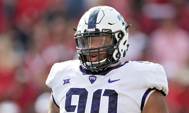 Ross Blacklock #90 of the TCU Horned Frogs looks over to the sidelines during a game against the Ar...