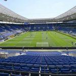 Players of Hoffenheim and Hertha warm-up in the empty stadium prior to the Bundesliga soccer match between TSG 1899 Hoffenheim and Hertha BSC Berlin in Sinsheim, Germany, Saturday, May 16, 2020. The German Bundesliga becomes the world's first major soccer league to resume after a two-month suspension because of the coronavirus pandemic. (Thomas Kienzle/AFP pool via AP)